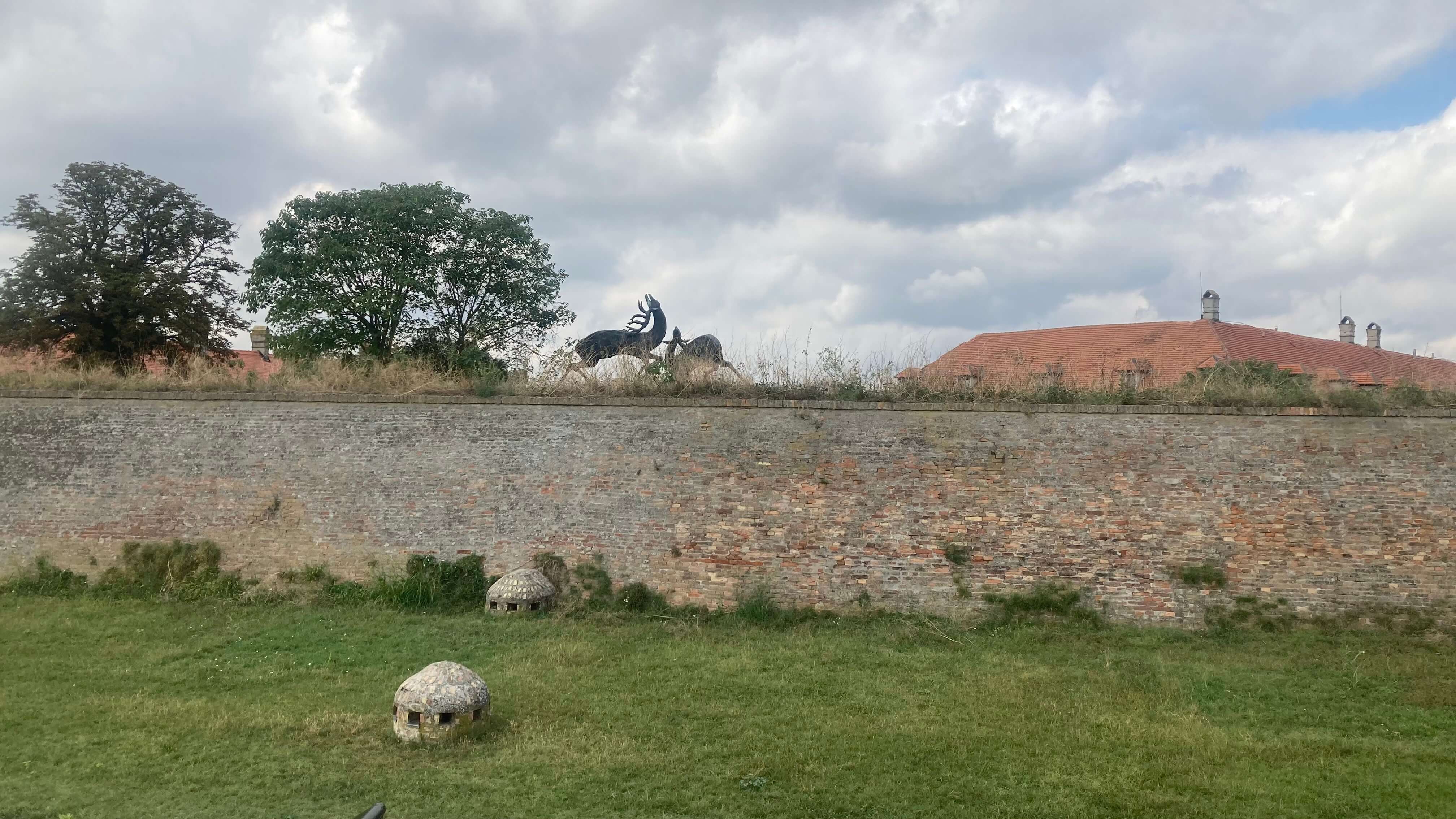 A Wall with Two Battling Deer